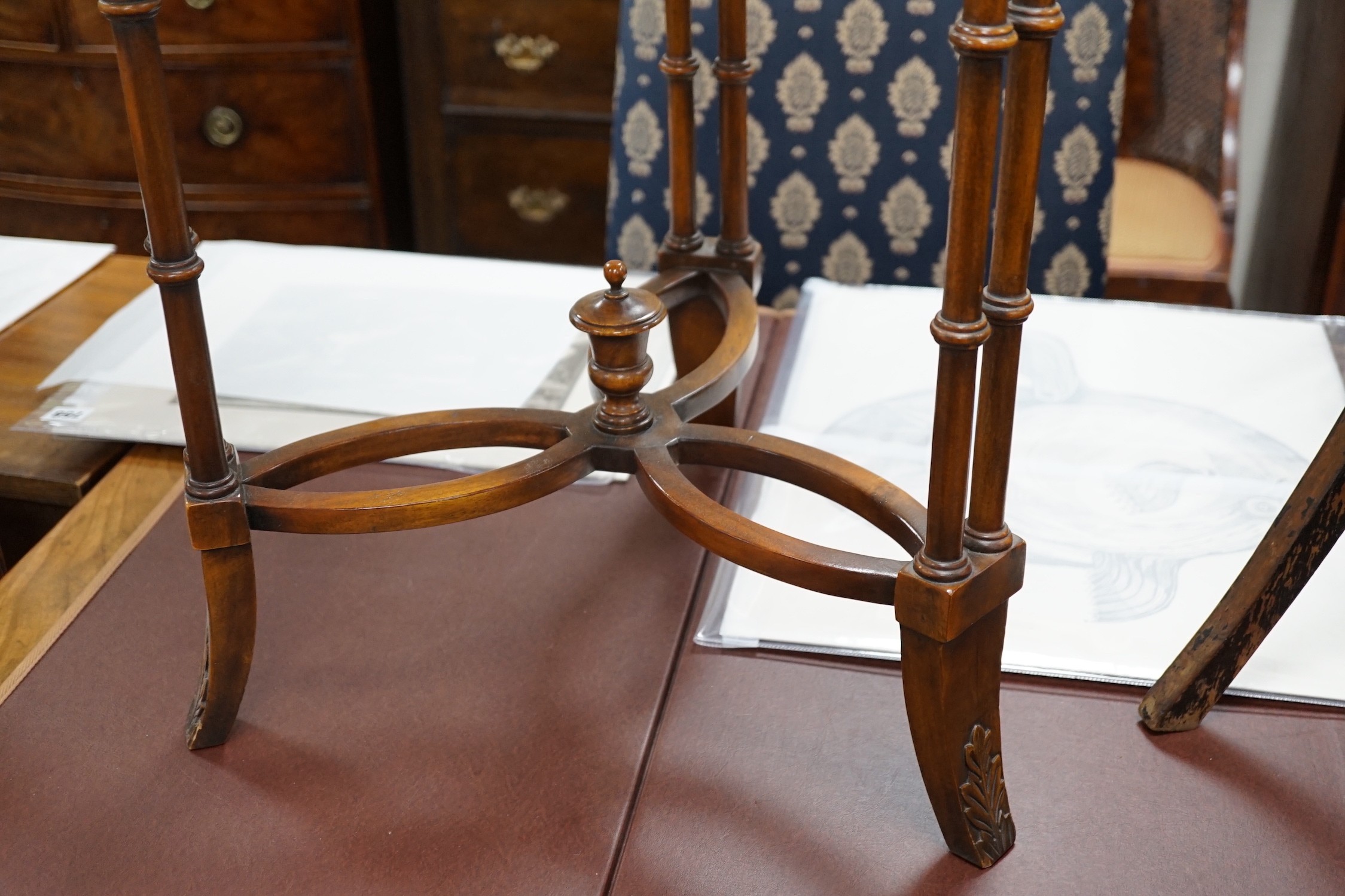 A leather topped mahogany occasional table with brass gallery, diameter 46cm *Please note the sale commences at 9am.